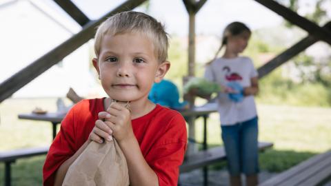 Photo of child with food bag 
