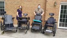 Photo of WOW workers with donated wheelchairs