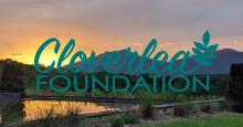 Cloverlea Foundation  logo with mountain sunset background