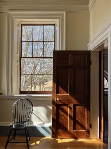 Light on walnut door